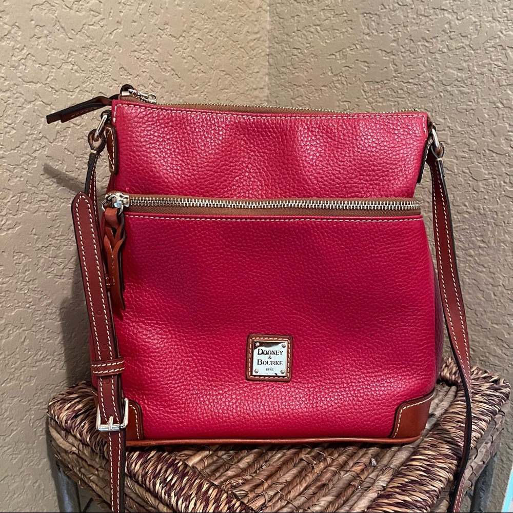 Elegant red leather vintage Dooney and Burke Purse in excellent condition.